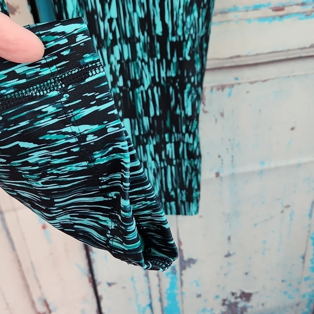 Nike Power Poly screen Printed Capri crop pants‎